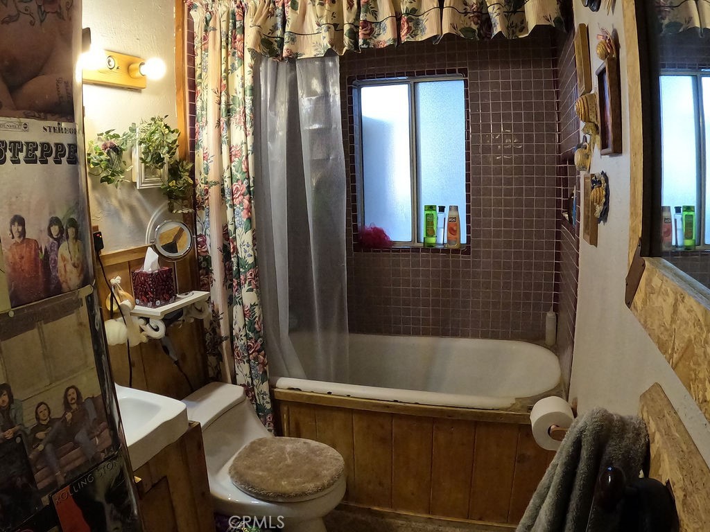 30000 Buchannon Ranch Road Llano, CA 93544 - Photo 57 of 64 a bathroom with a tub and shower