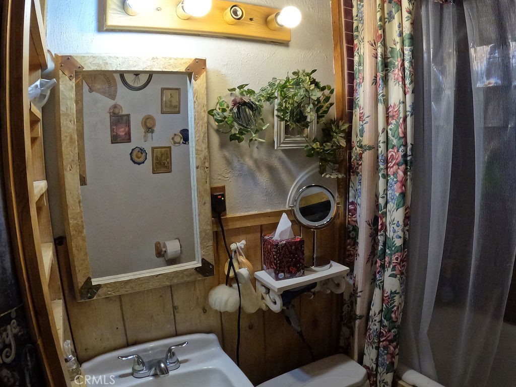 30000 Buchannon Ranch Road Llano, CA 93544 - Photo 61 of 67 a bathroom with a toilet and a shower