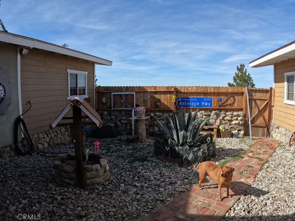 30000 Buchannon Ranch Road Llano, CA 93544 - Photo 63 of 64 a view of a house with backyard and sitting area