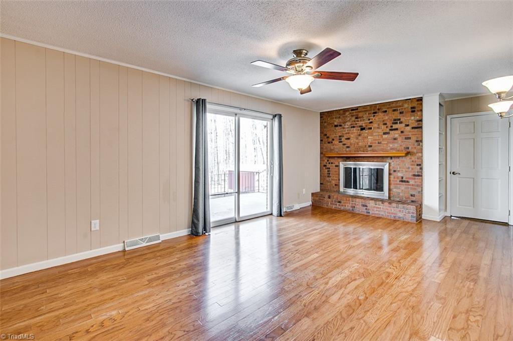 682 Inwood Road Asheboro, NC 27205 - Photo 13 of 40 Den, fireplace with gas logs