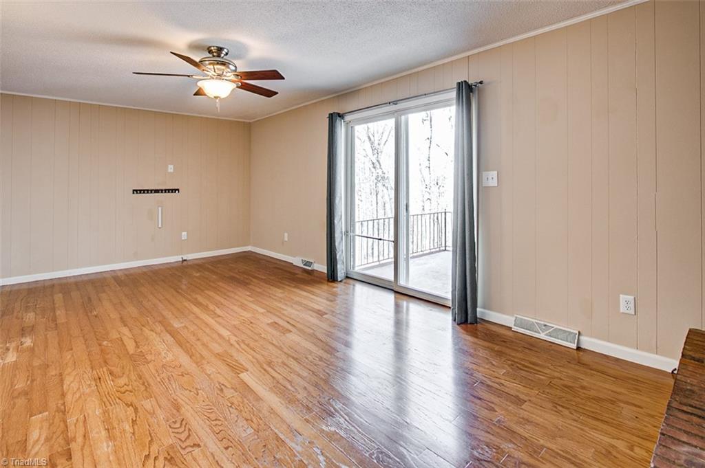 682 Inwood Road Asheboro, NC 27205 - Photo 14 of 40 Den, opens to the patio