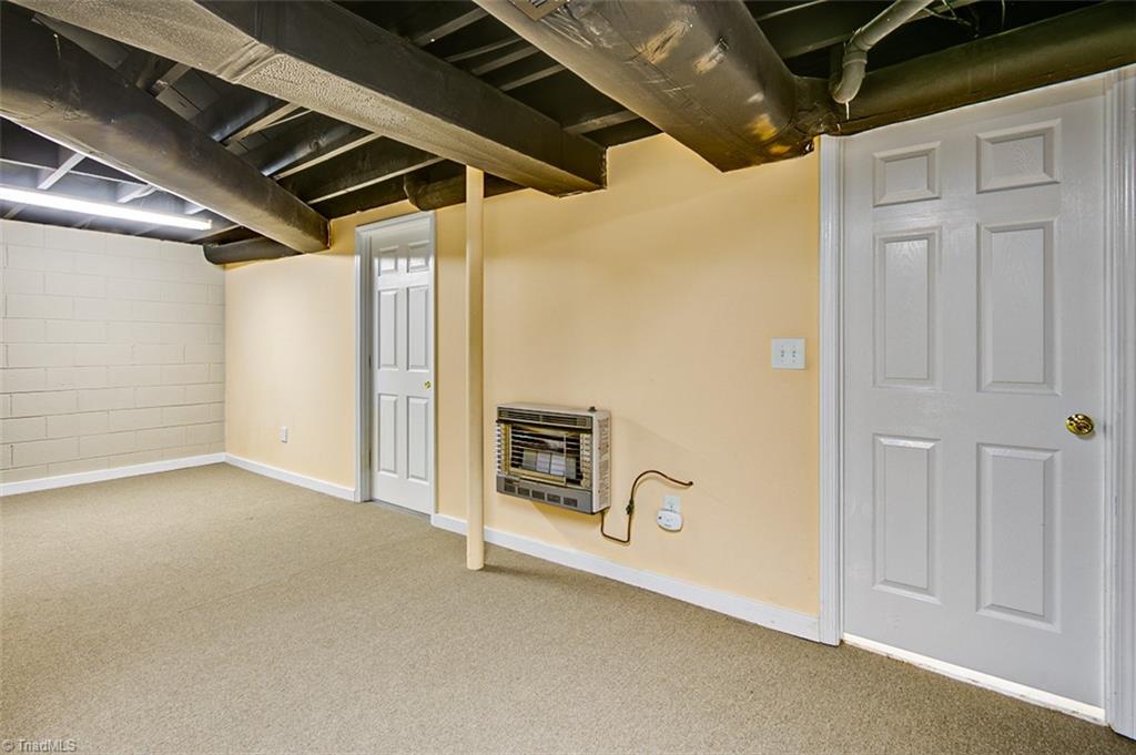 682 Inwood Road Asheboro, NC 27205 - Photo 24 of 40 Semi-finished basement Den area (not included in sq footage)