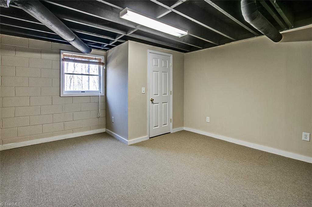 682 Inwood Road Asheboro, NC 27205 - Photo 31 of 40 Semi-finished basement office (not included in sq footage)