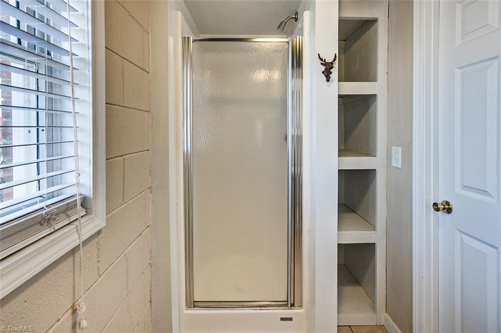 682 Inwood Road Asheboro, NC 27205 - Photo 33 of 40 Semi-finished basement Full bath, shower (not included in sq footage)