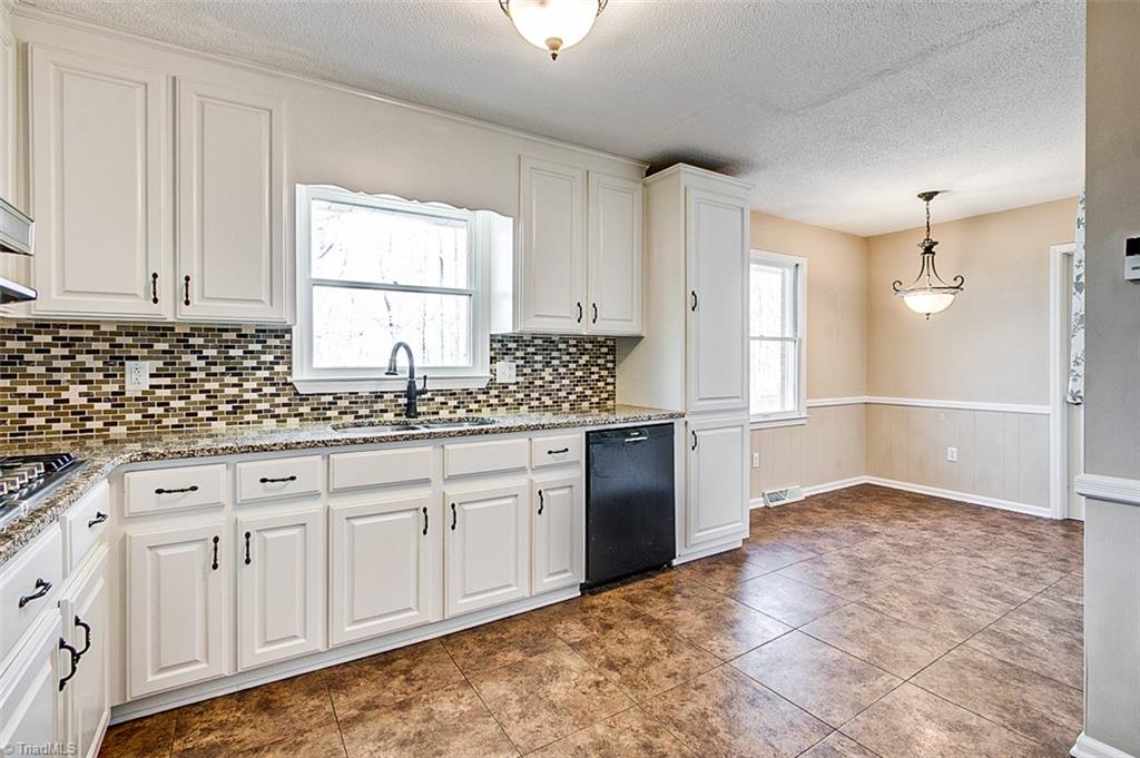 682 Inwood Road Asheboro, NC 27205 - Photo 6 of 40 Kitchen, looking into breakfast area