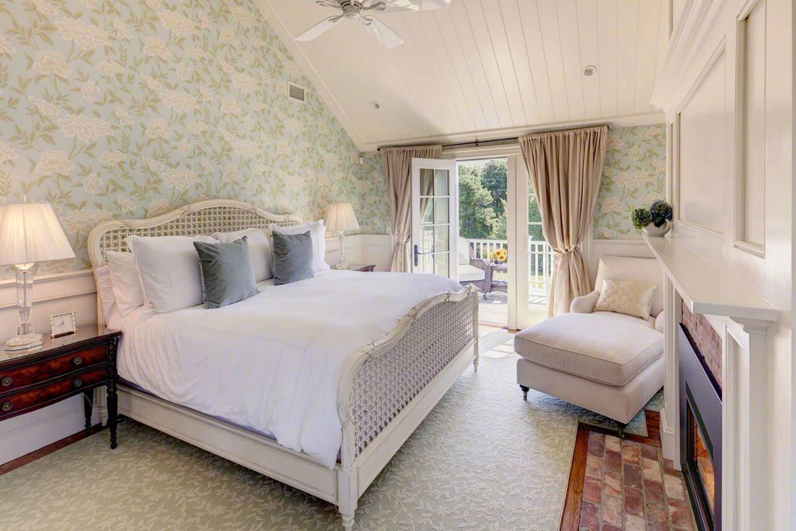 1 Field Club Drive Edgartown, MA 02539 - Photo 14 of 24 a spacious bedroom with a bed and a couch