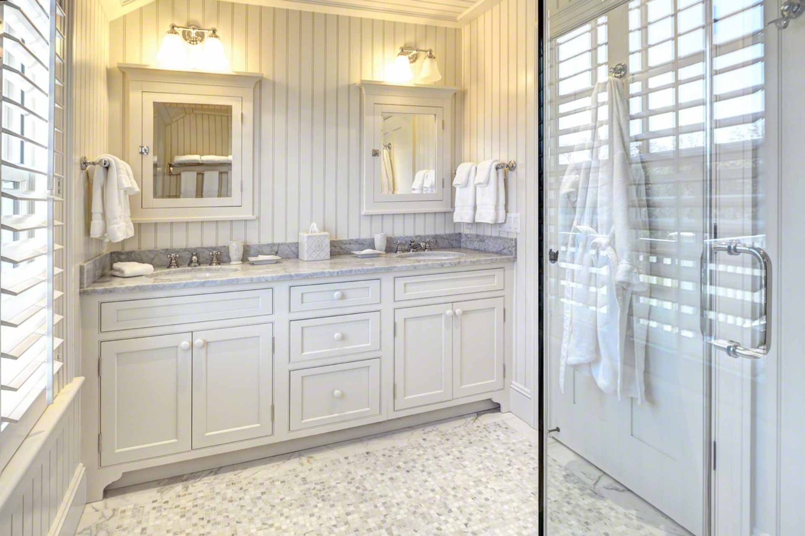 1 Field Club Drive Edgartown, MA 02539 - Photo 15 of 24 a bathroom with a granite countertop sink and a mirror