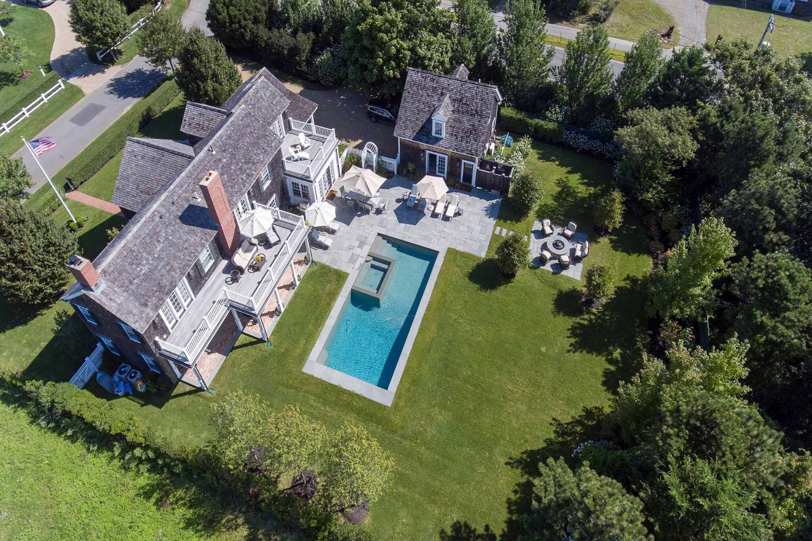 1 Field Club Drive Edgartown, MA 02539 - Photo 20 of 24 an aerial view of a house with a garden and swimming pool