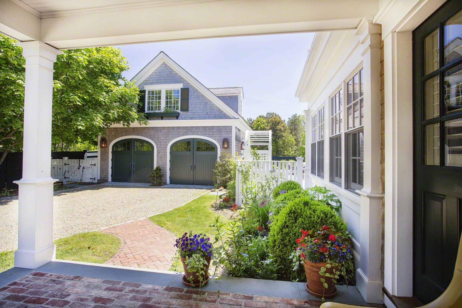 1 Field Club Drive Edgartown, MA 02539 - Photo 21 of 24 a front view of a house with a yard