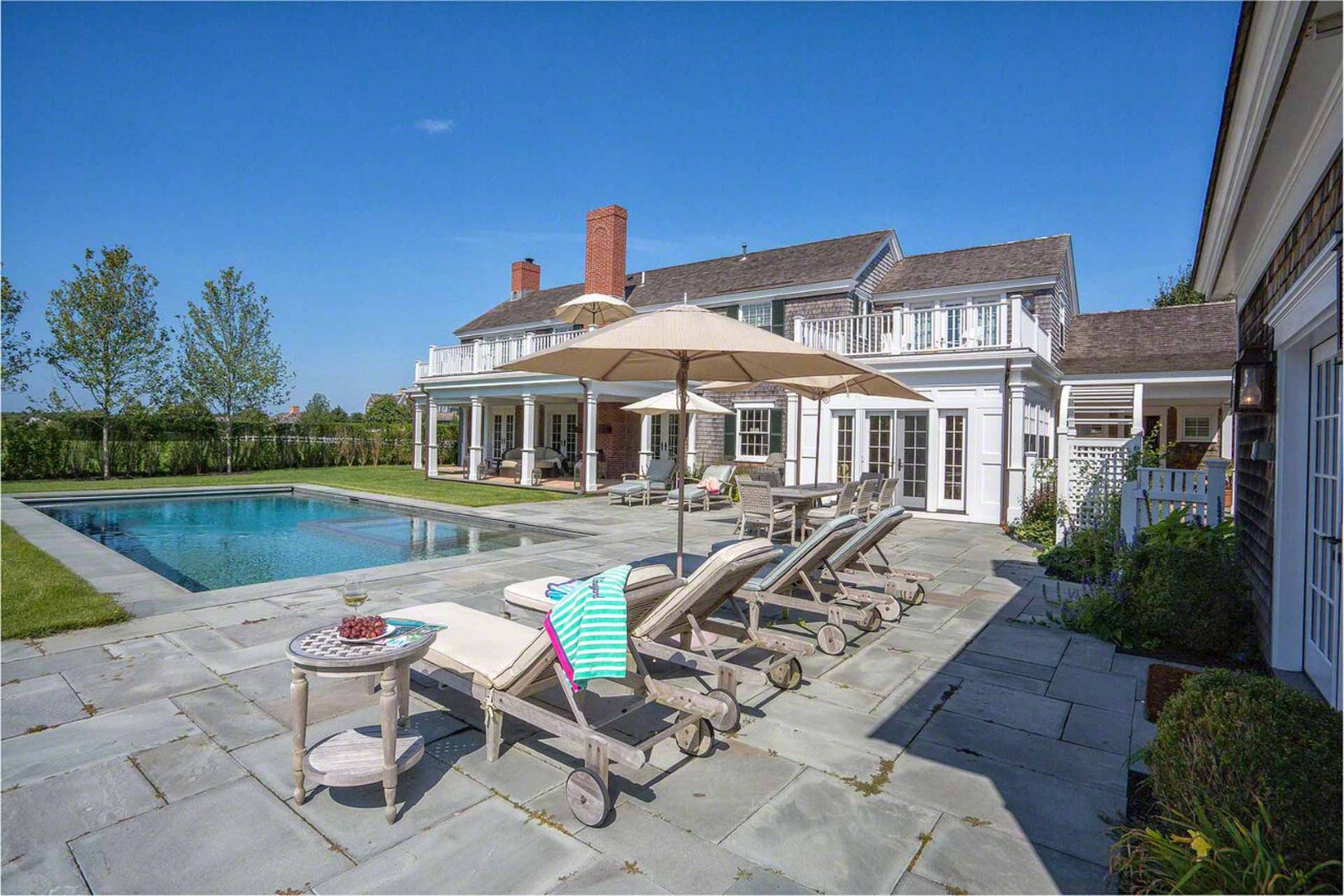 1 Field Club Drive Edgartown, MA 02539 - Photo 4 of 24 a view of a house with backyard and sitting area