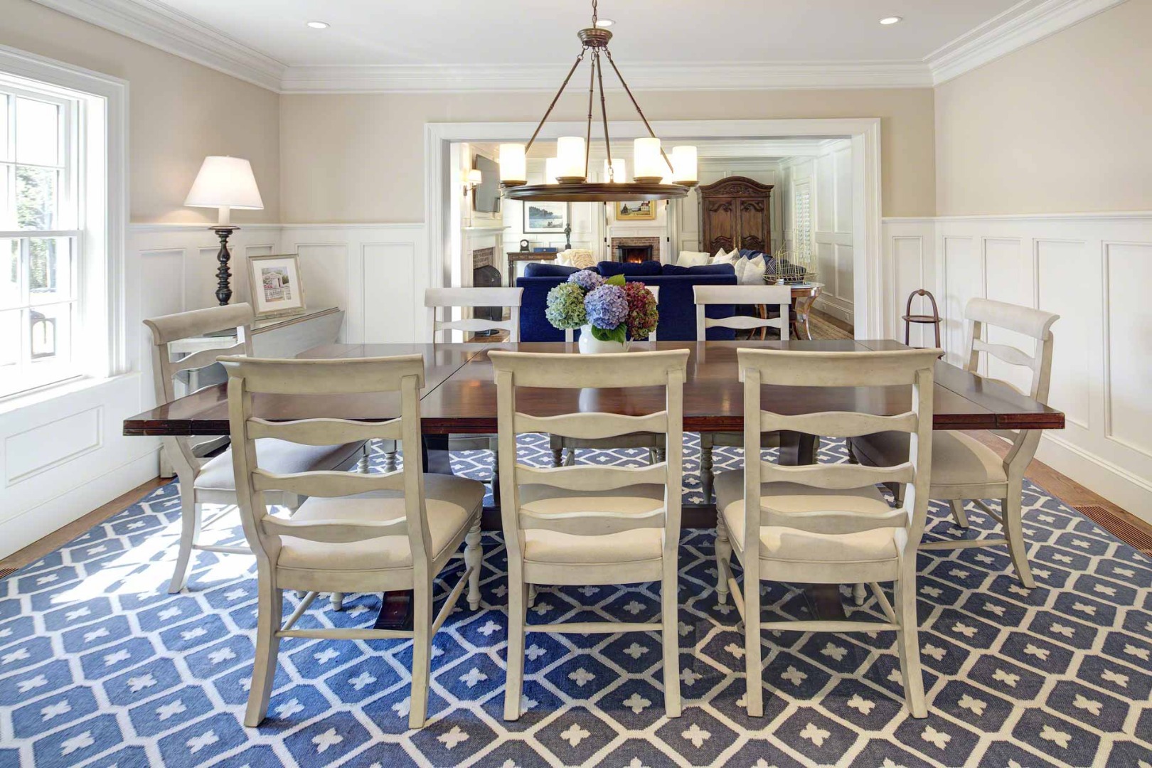 1 Field Club Drive Edgartown, MA 02539 - Photo 8 of 24 a view of a dining room with furniture a chandelier and wooden floor