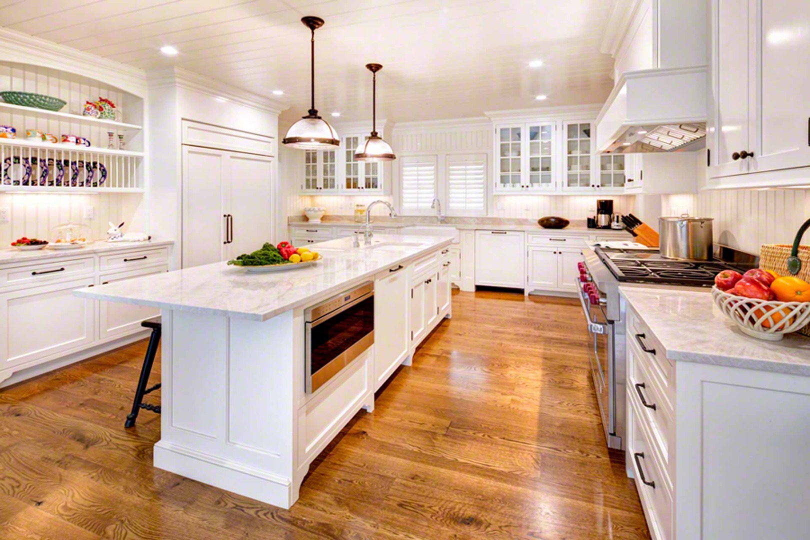 1 Field Club Drive Edgartown, MA 02539 - Photo 9 of 24 a kitchen with a stove sink and cabinets