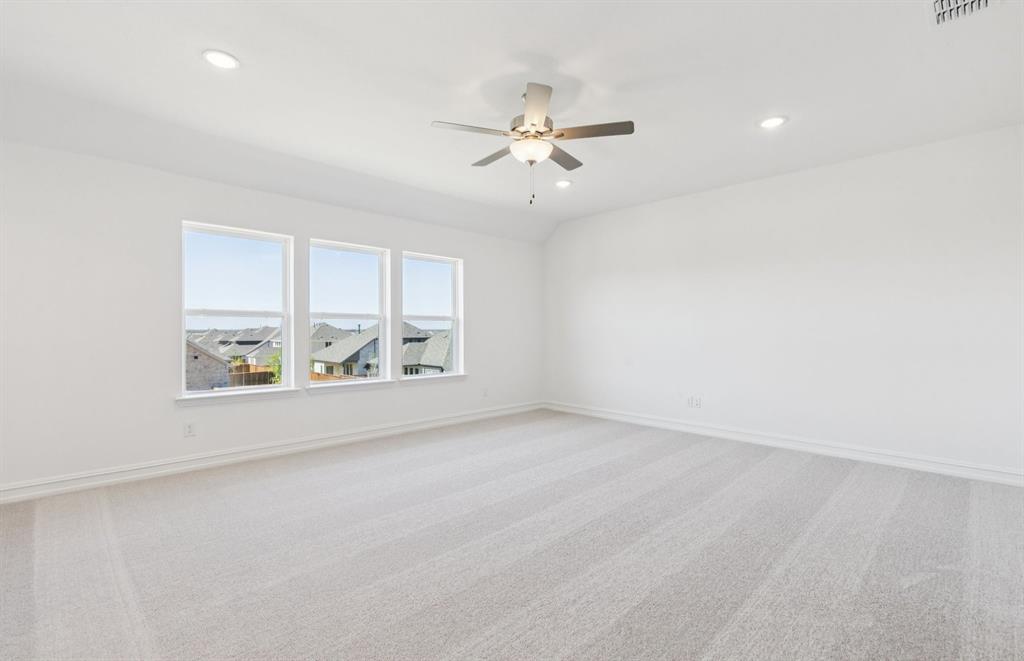 14550 Jemison Street Pilot Point, TX 76258 - Photo 16 of 23 Light-filled game room providing additional living space
