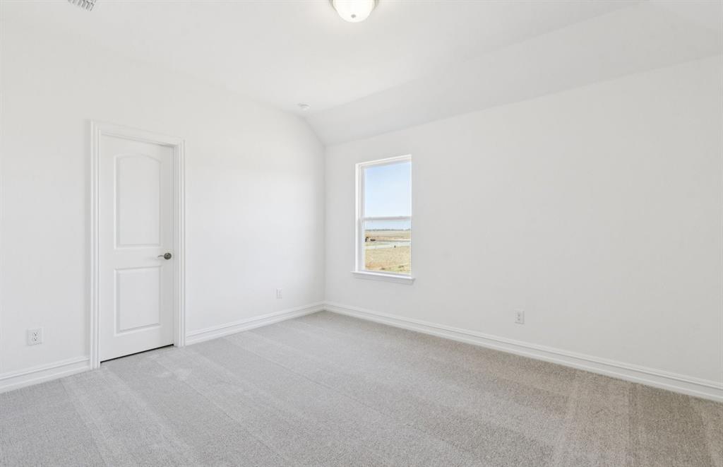 14550 Jemison Street Pilot Point, TX 76258 - Photo 18 of 23 Secondary bedroom with ample closet space