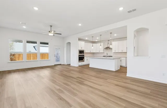 a view of kitchen with wooden floor
