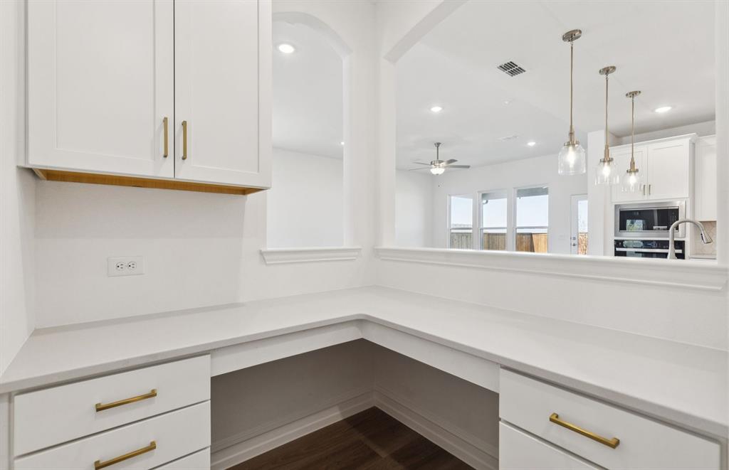 14550 Jemison Street Pilot Point, TX 76258 - Photo 7 of 23 Pulte Planning Center off kitchen and dining area