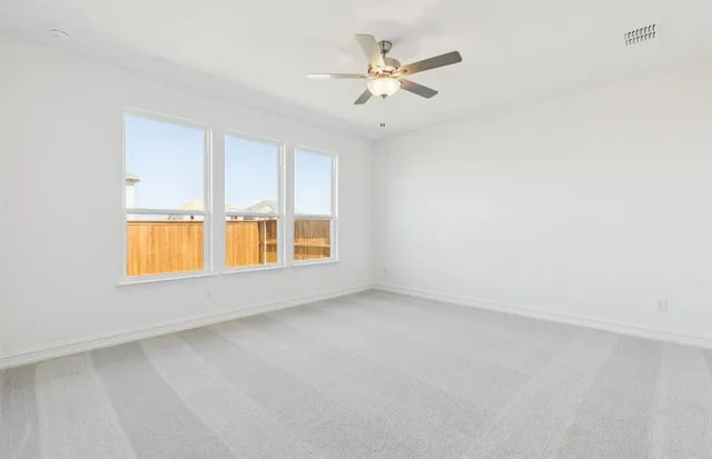 a spacious bathroom with a double vanity sink a mirror and a bathtub
