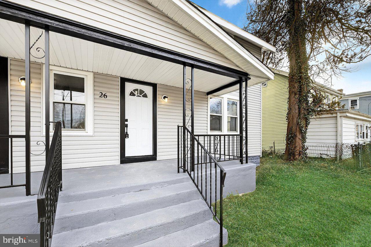 26 Olive Street Salem, NJ 08079 - Photo 2 of 33 a view of a porch with a backyard