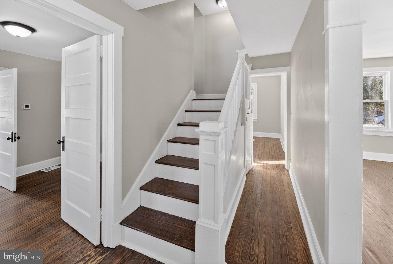 26 Olive Street Salem, NJ 08079 - Photo 29 of 33 a view of a hallway with wooden floor and entryway
