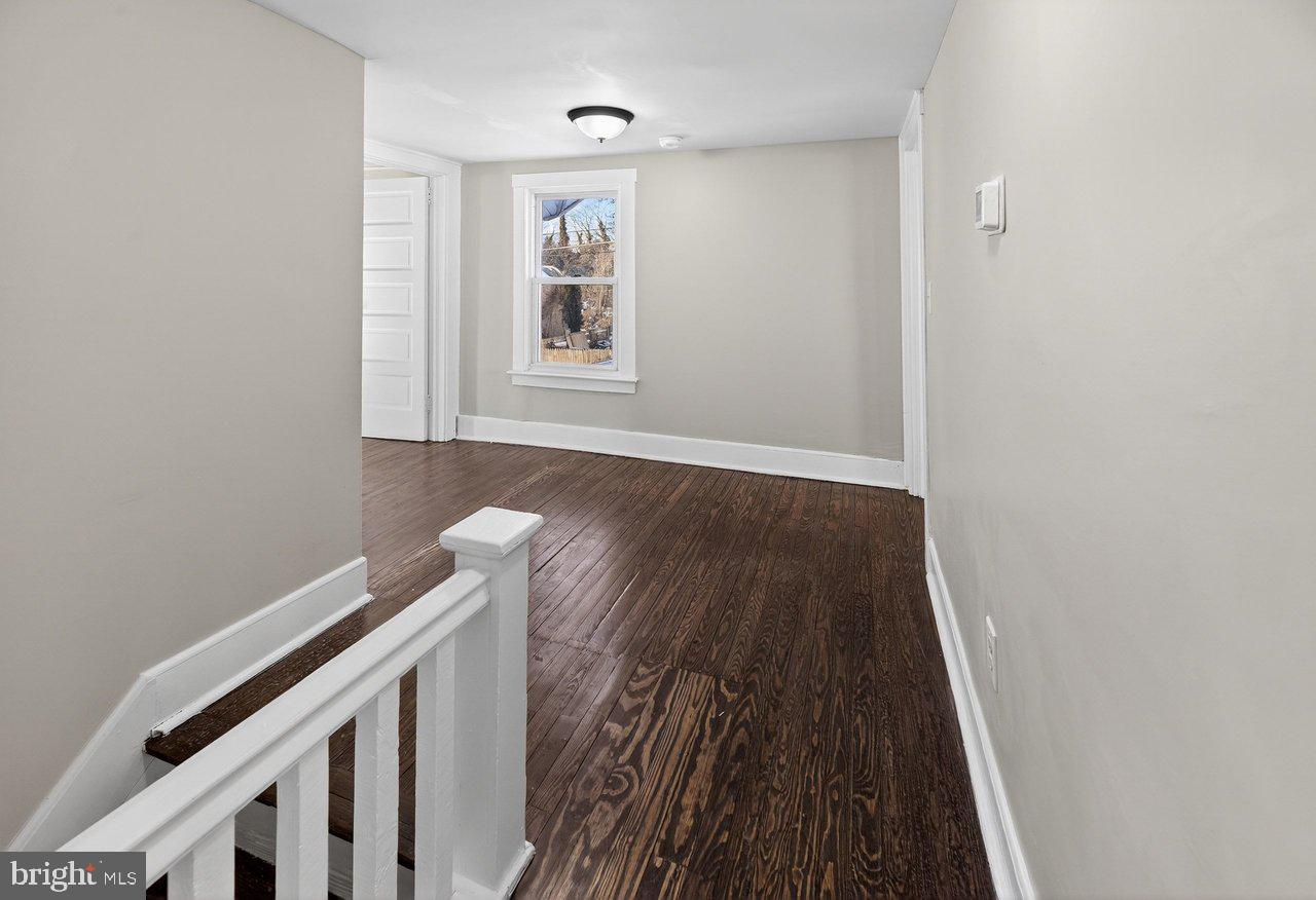 26 Olive Street Salem, NJ 08079 - Photo 30 of 33 a view of a room with wooden floor and window