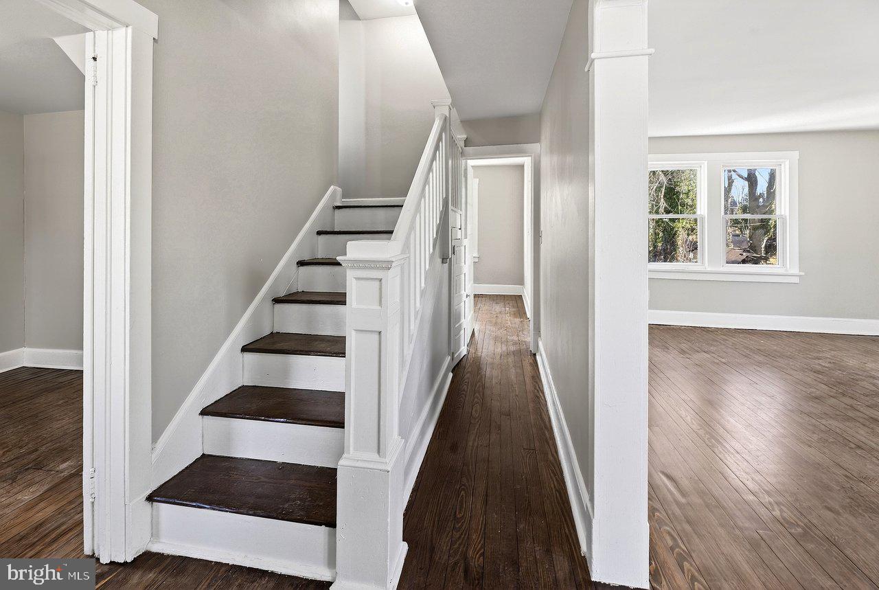 26 Olive Street Salem, NJ 08079 - Photo 3 of 33 wooden floor with a window and wooden floor