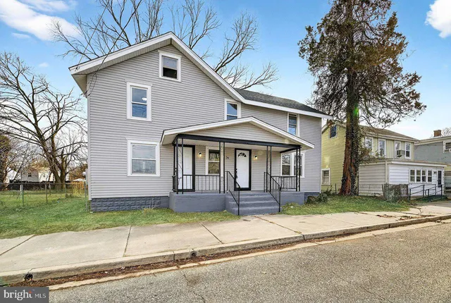 a kitchen with stainless steel appliances granite countertop a refrigerator sink and cabinets