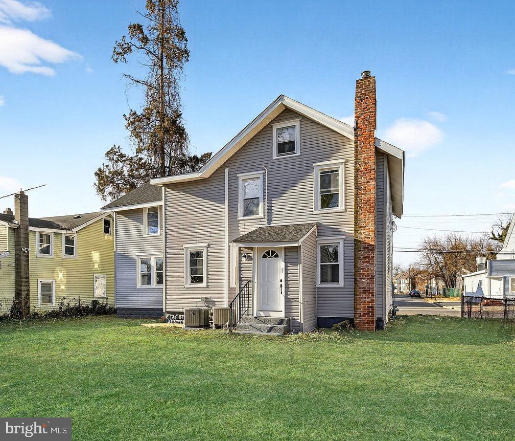26 Olive Street Salem, NJ 08079 - Photo 32 of 33 a view of a house with a yard