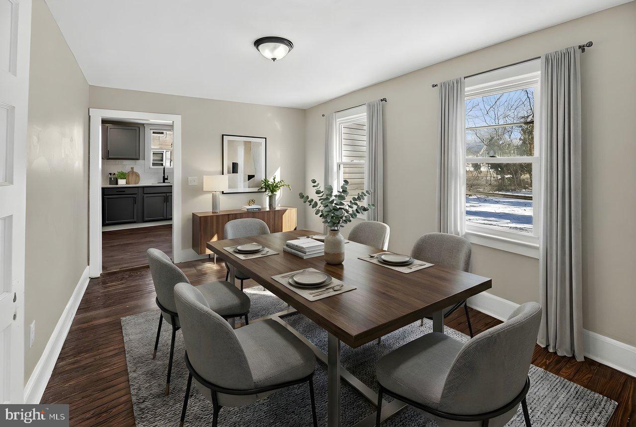 26 Olive Street Salem, NJ 08079 - Photo 8 of 33 a view of a dining room with furniture window and wooden floor