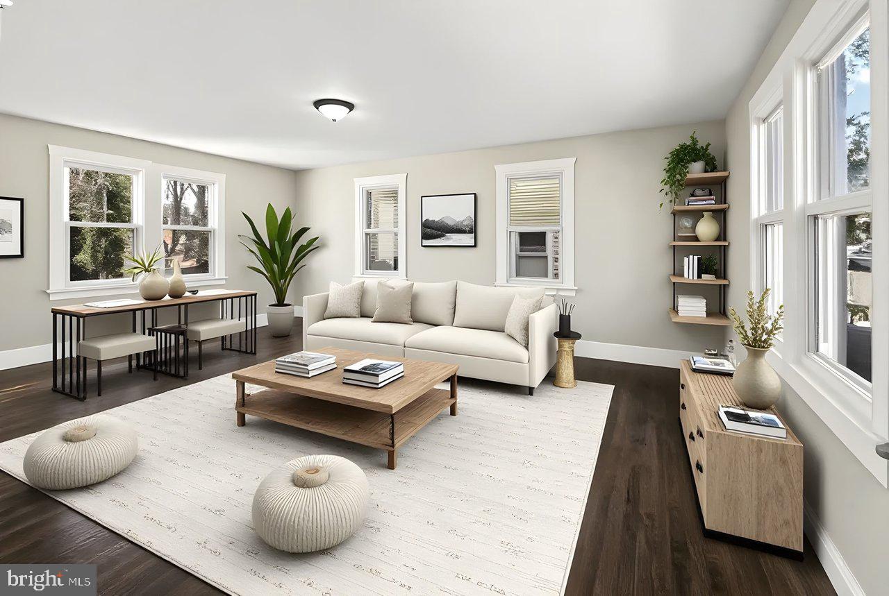 26 Olive Street Salem, NJ 08079 - Photo 9 of 33 a living room with furniture and a couch