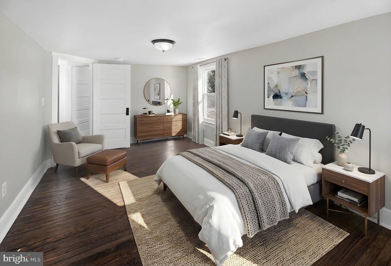 26 Olive Street Salem, NJ 08079 - Photo 10 of 33 a bedroom with bed and window