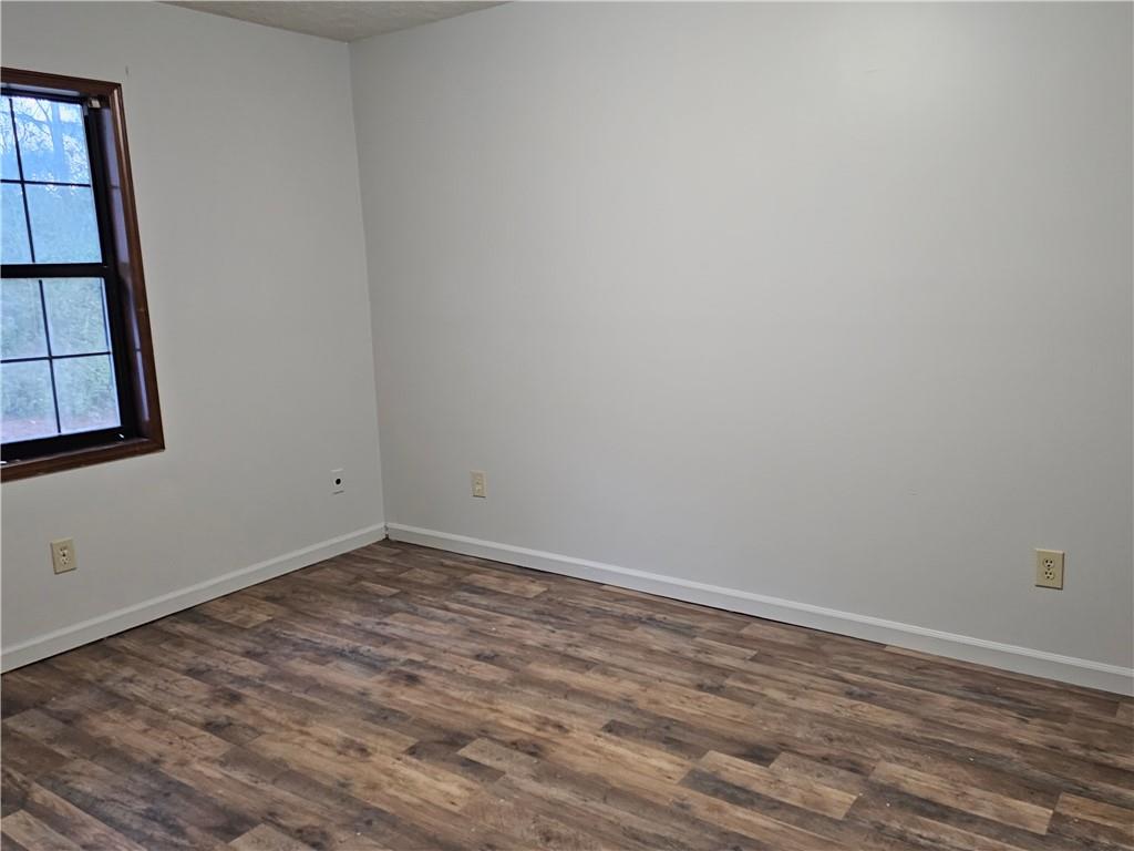 2835 Springdale Road, Unit B Snellville, GA 30039 - Photo 3 of 20 wooden floor in an empty room