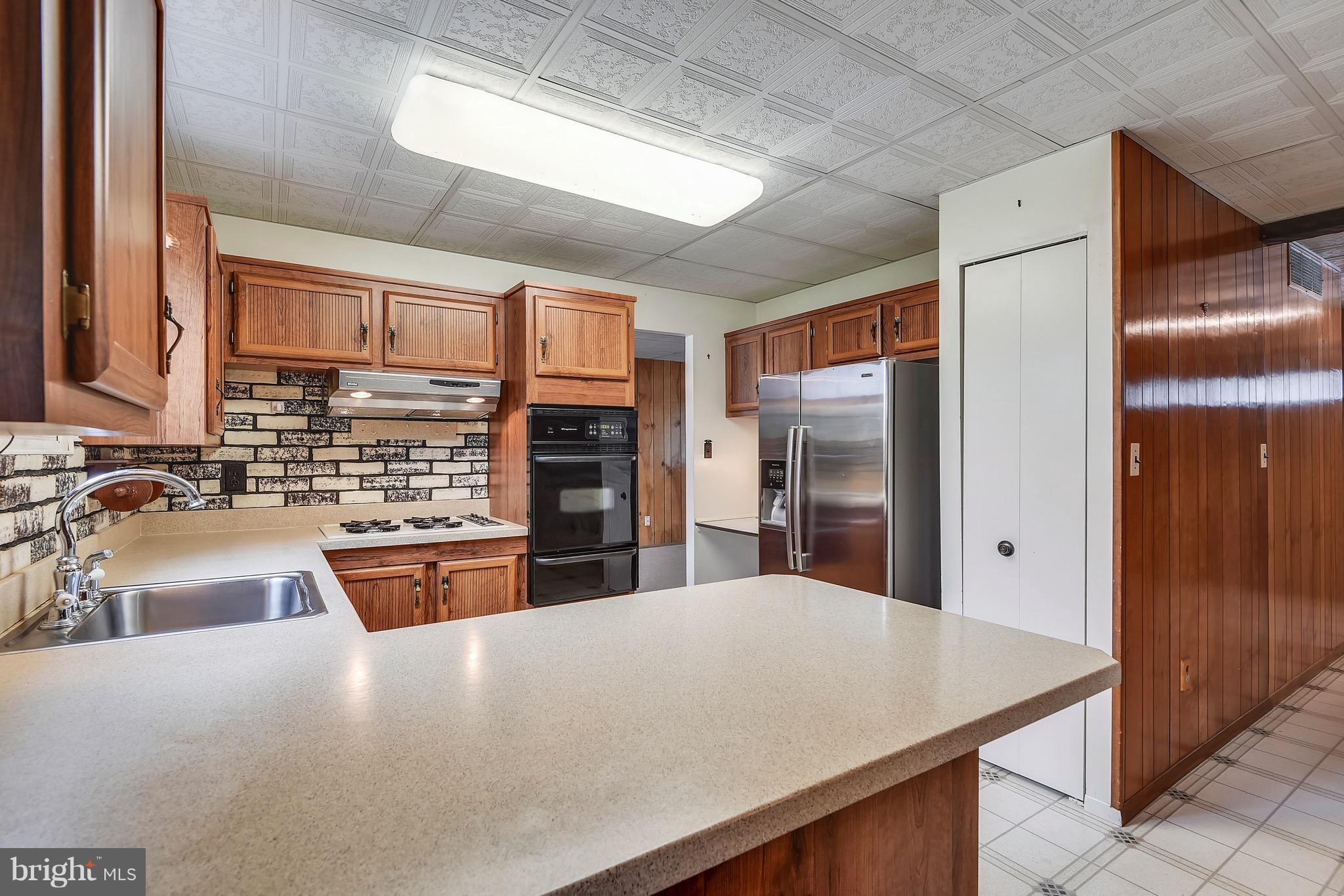 9222 Sandra Park Road Perry Hall, MD 21128 - Photo 14 of 30 Kitchen; view into dining; desk area