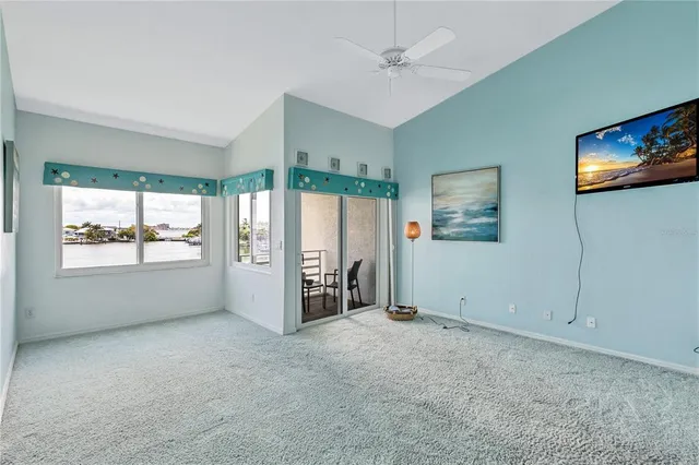 a bathroom with a granite countertop sink a mirror and shower