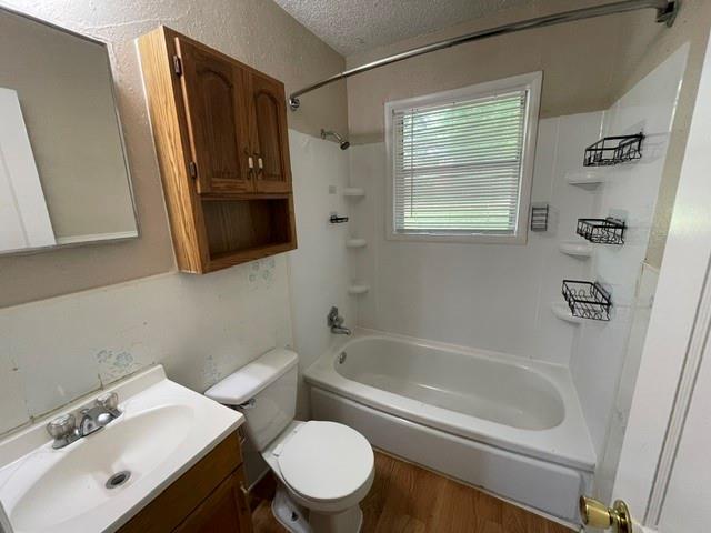 845 Rumfield Road White Settlement, TX 76108 - Photo 11 of 19 a bathroom with a sink toilet and shower