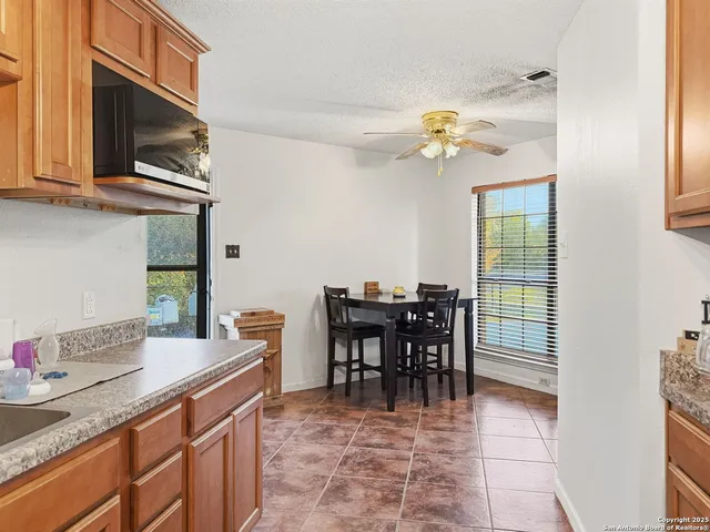 a view of a dining room with furniture