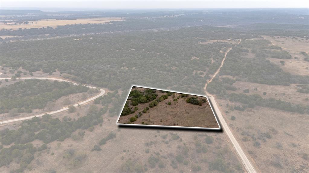Tbd Tbd Road Palo Pinto, TX 76484 - Photo 6 of 19 Overview of rural landscape featuring property boundaries highlighted