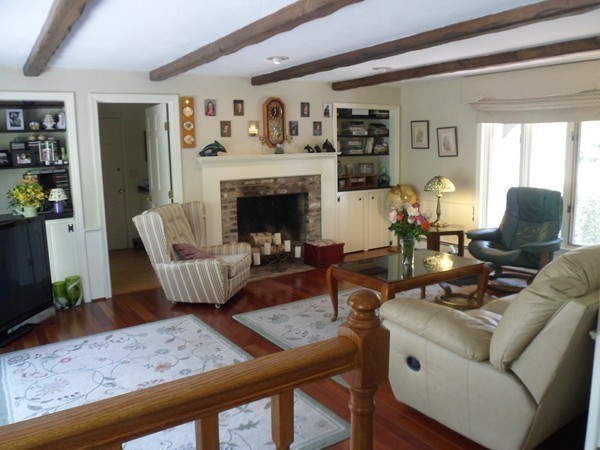 27 Westcott Road Harvard, MA 01451 - Photo 16 of 30 a living room with furniture and a fireplace