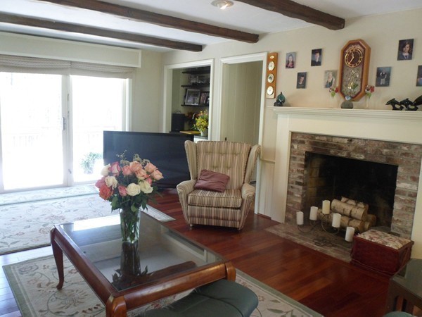 27 Westcott Road Harvard, MA 01451 - Photo 17 of 30 a living room with furniture and a fireplace