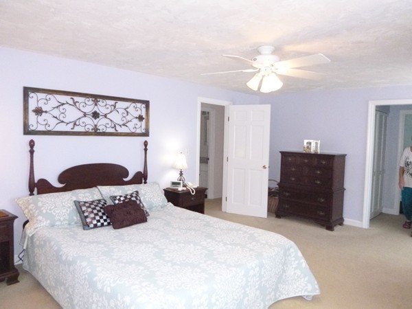 27 Westcott Road Harvard, MA 01451 - Photo 19 of 30 a bedroom with a bed and a dresser