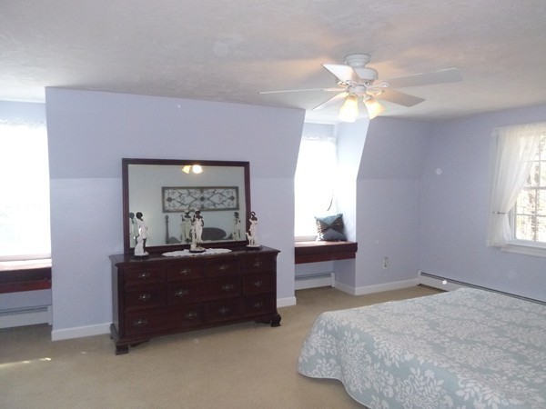 27 Westcott Road Harvard, MA 01451 - Photo 20 of 30 a bed room with a bed and a dresser
