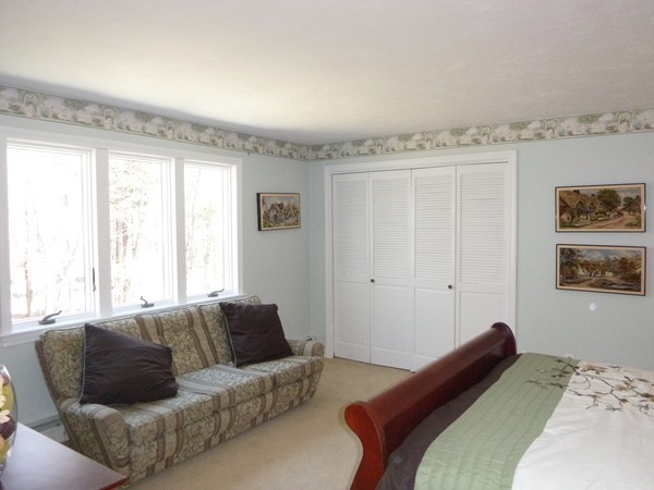 27 Westcott Road Harvard, MA 01451 - Photo 23 of 30 a bedroom with a bed couch and window