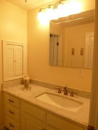 27 Westcott Road Harvard, MA 01451 - Photo 26 of 30 a bathroom with a sink and a mirror