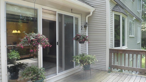 27 Westcott Road Harvard, MA 01451 - Photo 28 of 30 a front view of a house with a porch