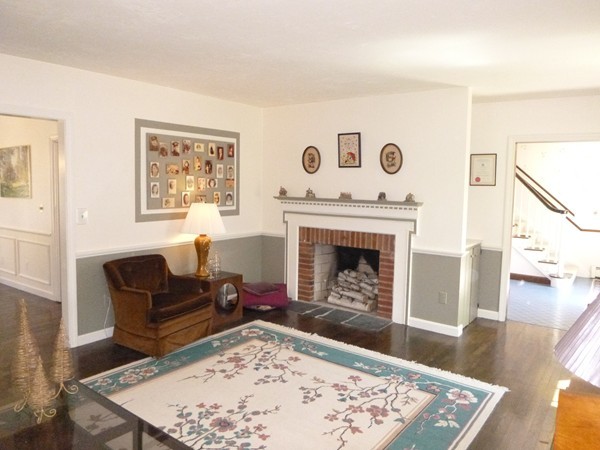 27 Westcott Road Harvard, MA 01451 - Photo 4 of 30 a living room with furniture and a fireplace