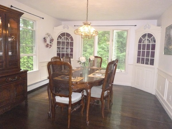 27 Westcott Road Harvard, MA 01451 - Photo 7 of 30 a view of a dining room with furniture window and wooden floor