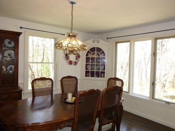 27 Westcott Road Harvard, MA 01451 - Photo 9 of 30 a dining room with furniture and window
