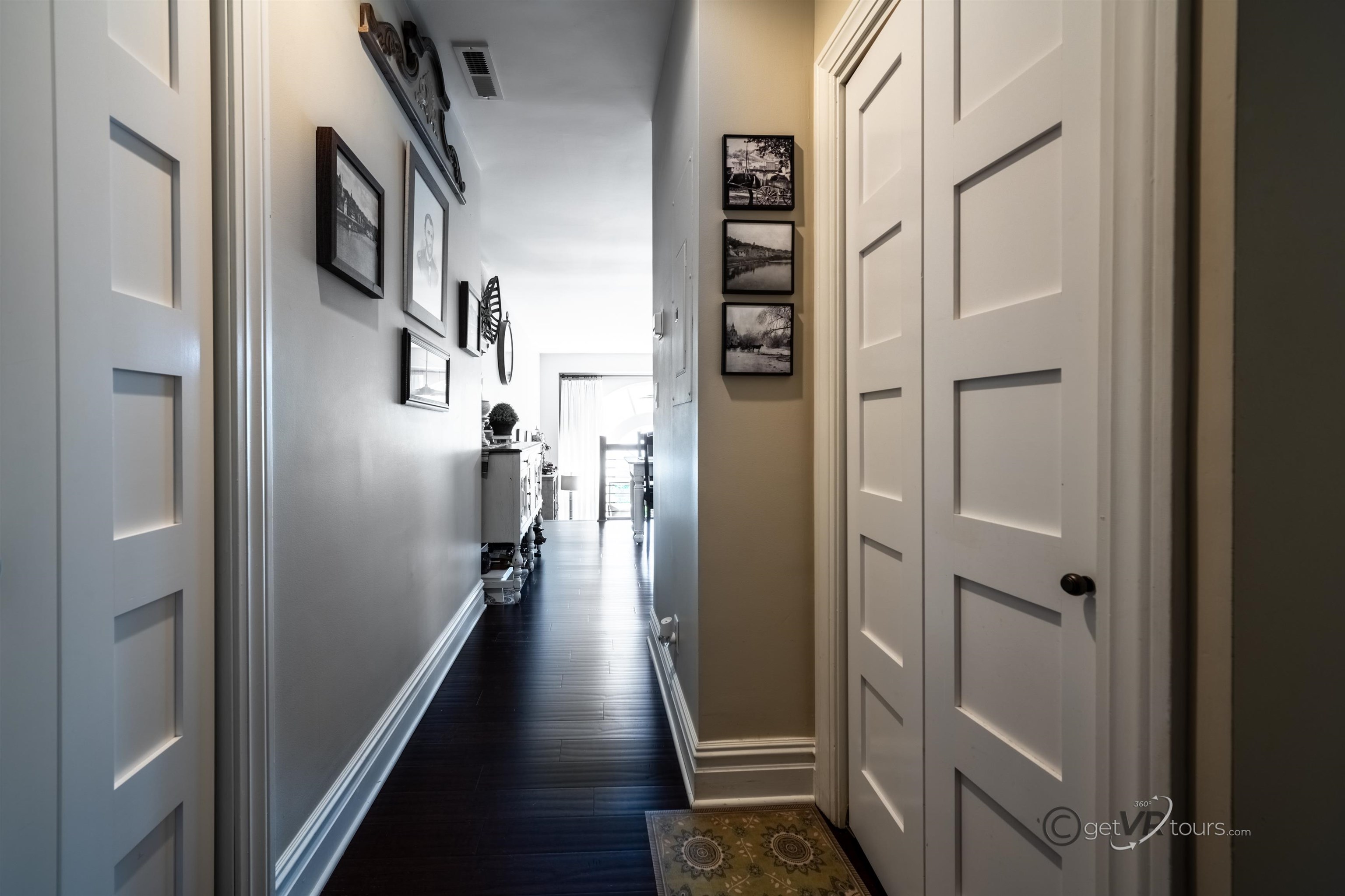 411 South Prospect Street Galena, IL 61036 - Photo 2 of 28 a view of a hallway with wooden floor and staircase