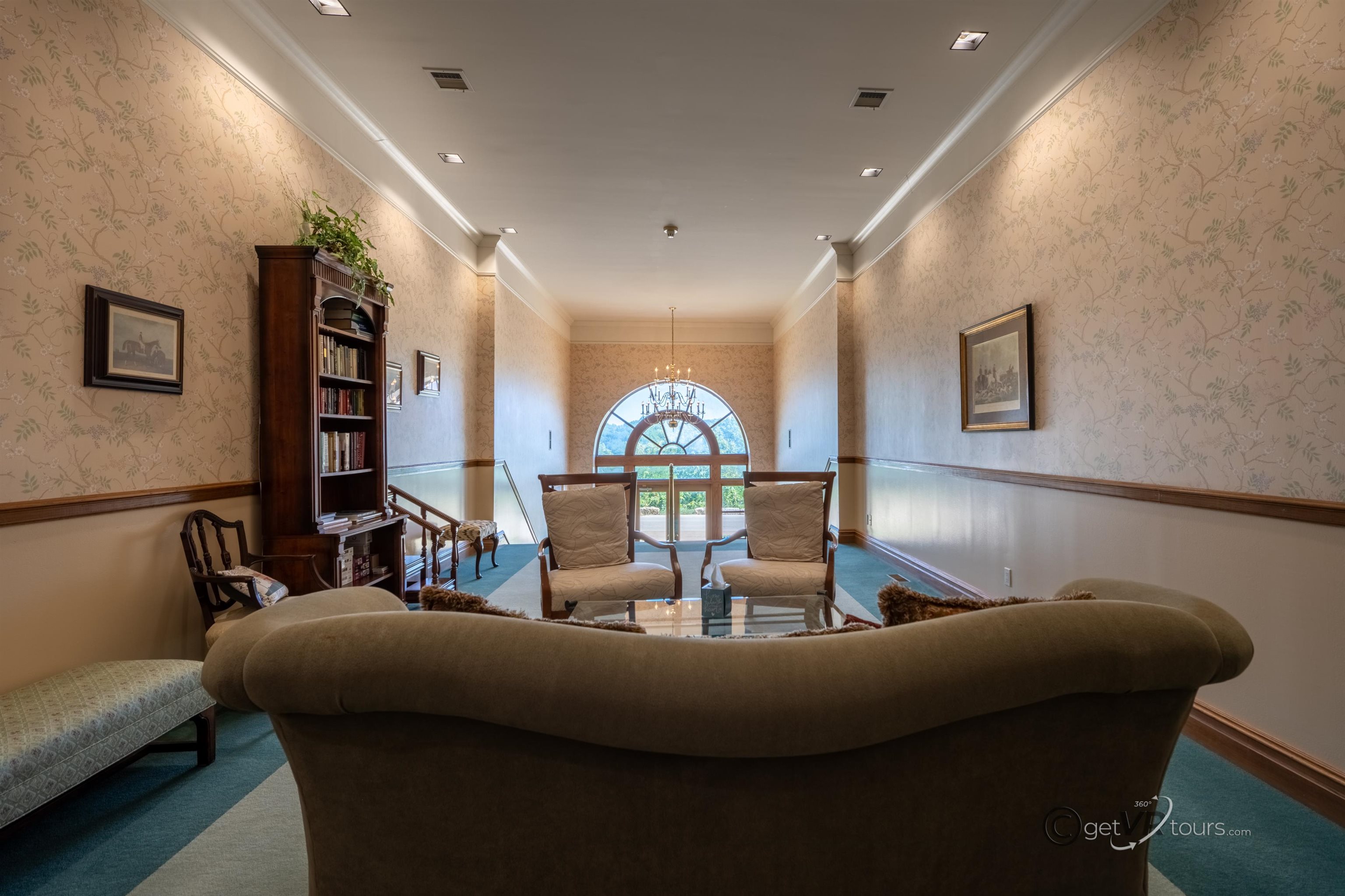 411 South Prospect Street Galena, IL 61036 - Photo 26 of 28 a living room with furniture and painting on the wall