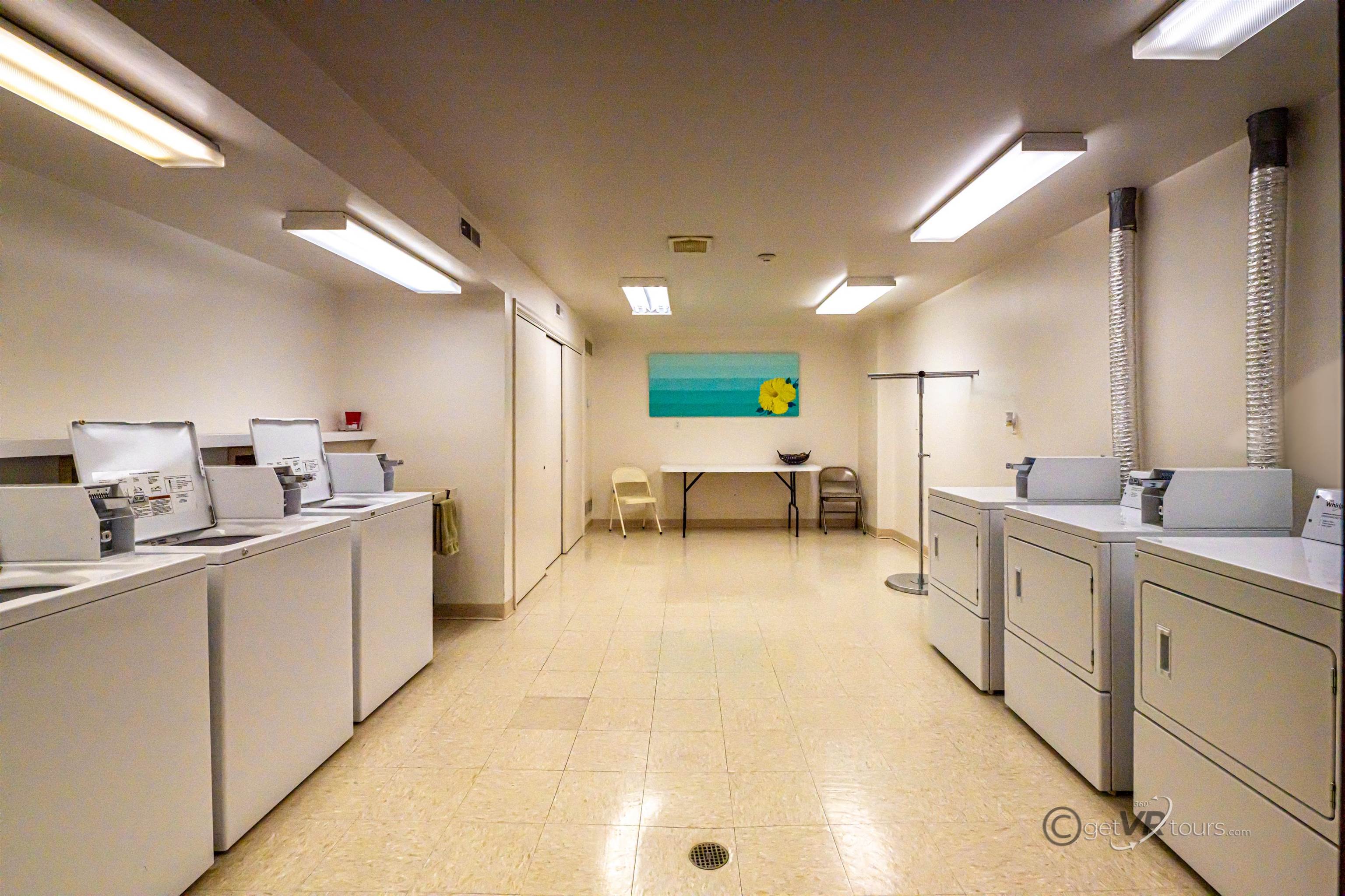411 South Prospect Street Galena, IL 61036 - Photo 27 of 28 a large white kitchen with a sink and cabinets