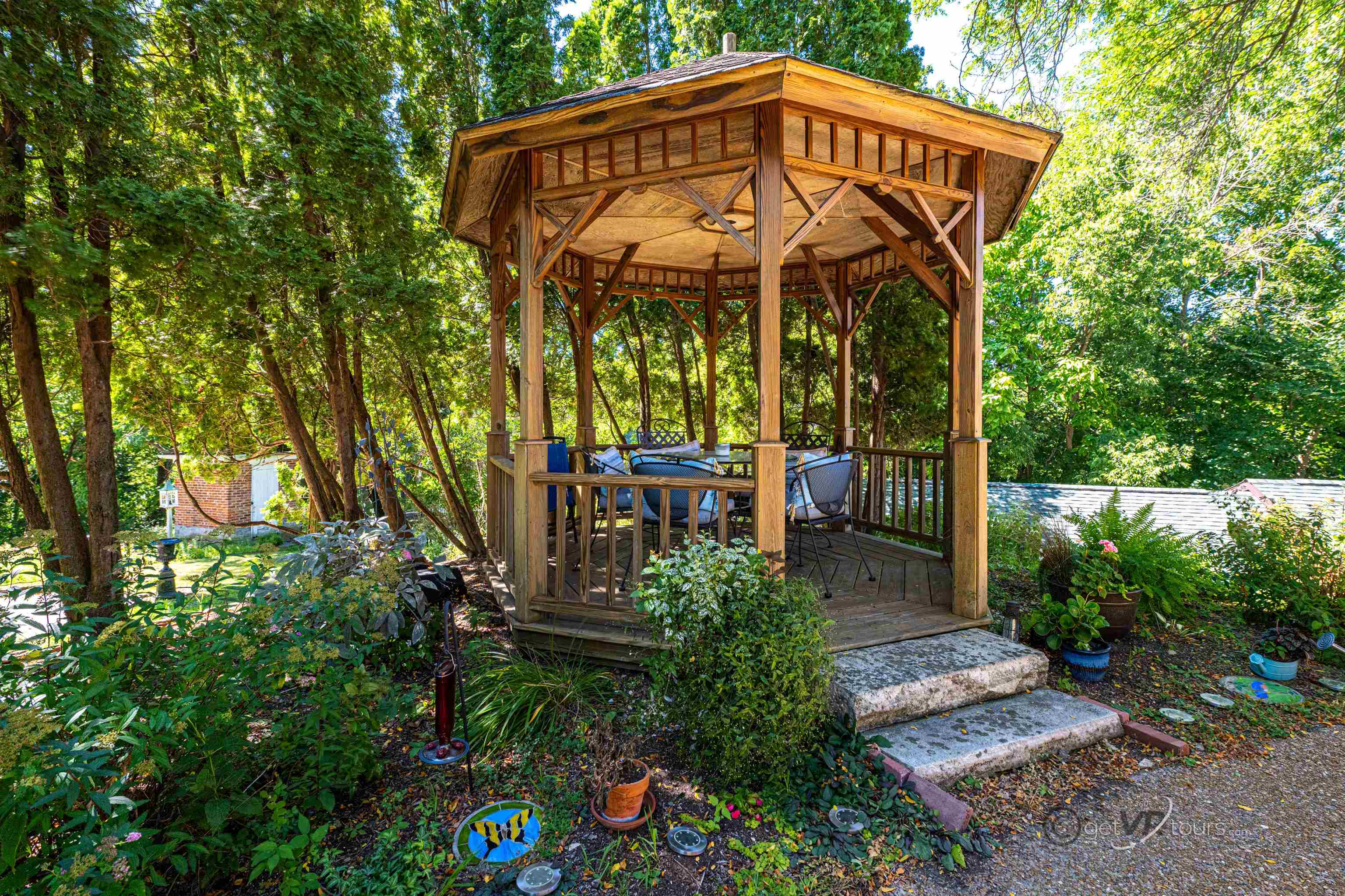 411 South Prospect Street Galena, IL 61036 - Photo 28 of 28 a view of a chair and table in the garden